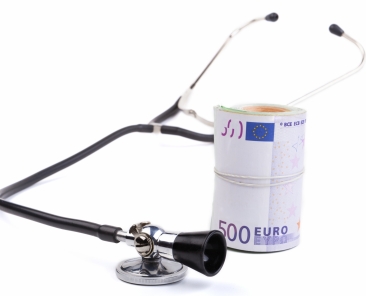 Black stethoscope closeup with euro isolated on white background